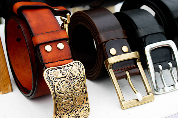 istock Close-up of genuine leather belts on display 2252772153
