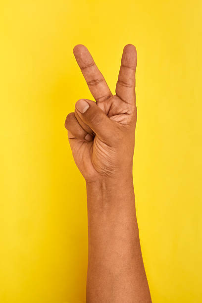 istock A leadership and empowerment concept shown through a hand forming a victory gesture, symbolizing confidence and forward momentum. 2252777423