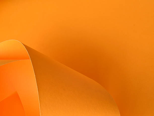 istock A single curl of orange paper 2252778451