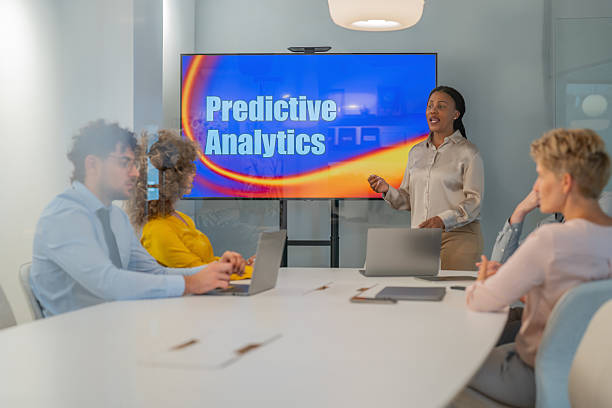 istock Businesswoman leading predictive analytics presentation in modern office 2252783401
