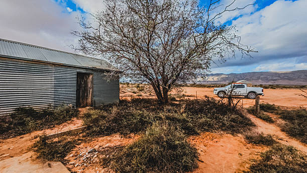 4x4 and old barn in outback Australia,