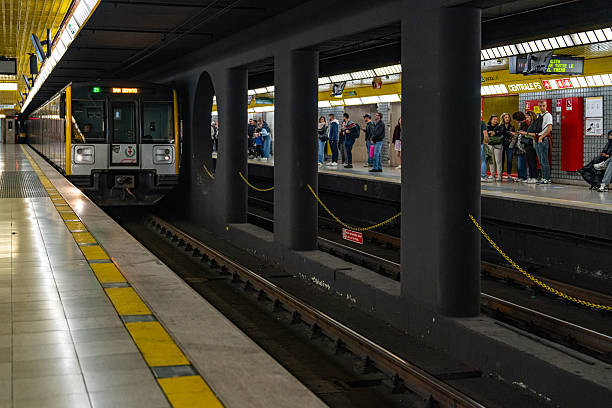 MILAN, ITALY - October 12, 2025:  Tourists are wait the subway. The view of Centrale FS Subway station, Milan, Italy.