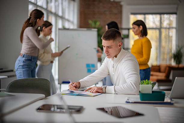 istock Colleagues work together in an office setting with a focus on teamwork and business activities during the day 2252797092