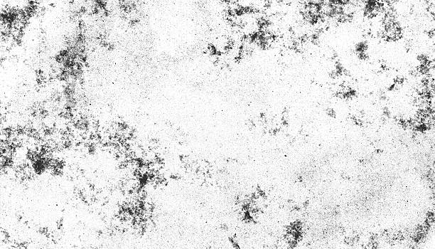 istock Grunge black and white texture with scattered dark spots and speckles, creating distressed and vintage effect 2252799561