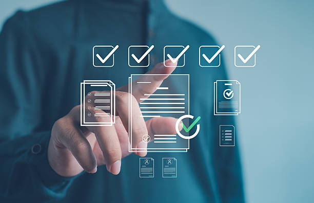 istock business professional interacting with digital checkmarks and document icons, representing approval workflow, document verification, efficient digital process management in modern organizations. 2252800405