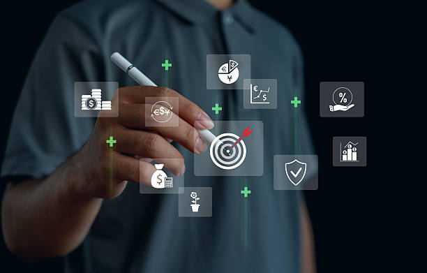 istock Hand using stylus selecting financial target with digital economy icons, representing investment growth, business strategy, profit analysis, financial planning, risk management, smart digital finance. 2252800417