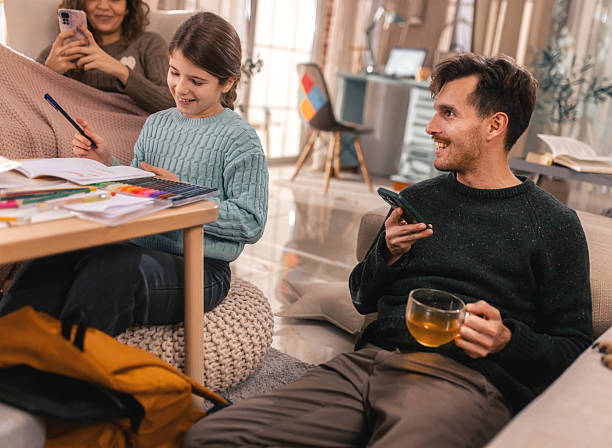 istock Modern family learning together with Ai  homework assistance on smartphone 2252801876