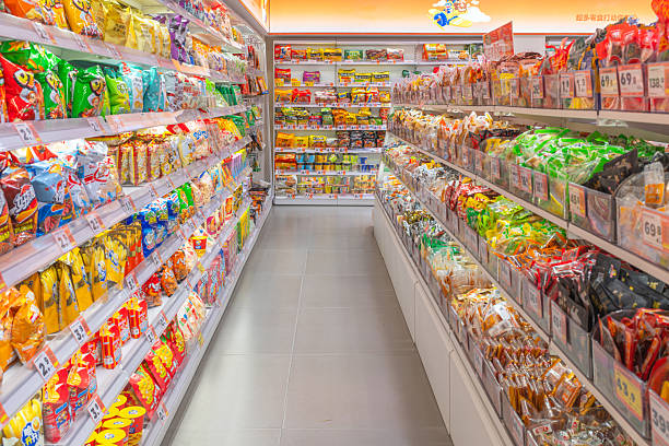 istock Well-stocked snack aisle in a bright modern supermarket 2252809672