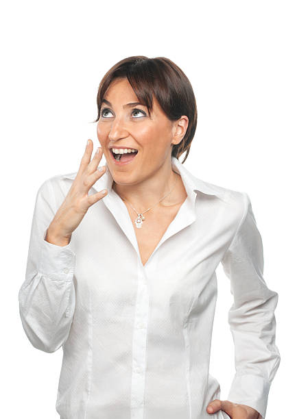 A beautiful brunette woman is shocked