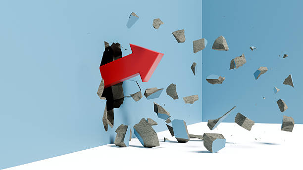 istock Large red arrow crashing through a solid wall, symbolizing breakthrough, market disruption, and overcoming obstacles, 3d render 2252814650