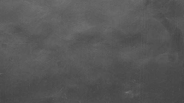 istock Dark grey cement wall texture background, smooth concrete surface for industrial and minimal interior design. 2252815789