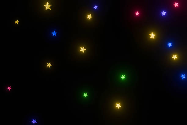 istock Colorful stars on a black background 2252816660