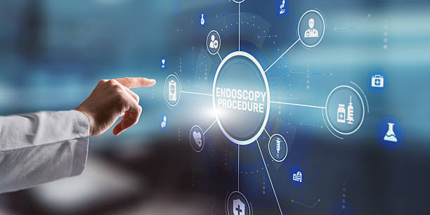 istock Hand pressing the ENDOSCOPY PROCEDURE button on a digital screen in a medical setting 2252821629