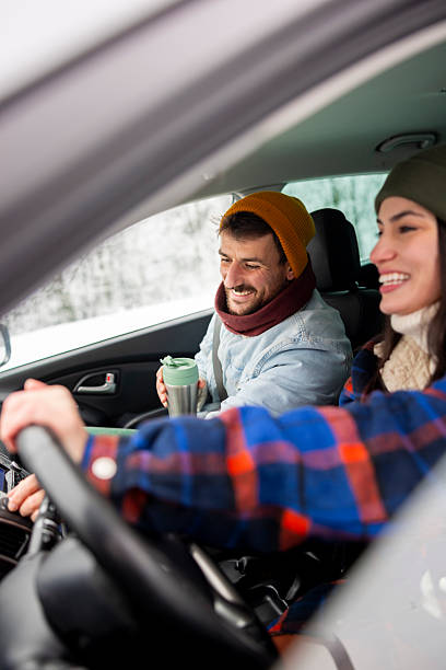 istock Couple travelling to winter vacation by car 2252823949