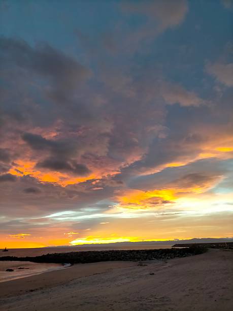 istock fire in the sky as sunrise develops in Burela, Spain 2252824870