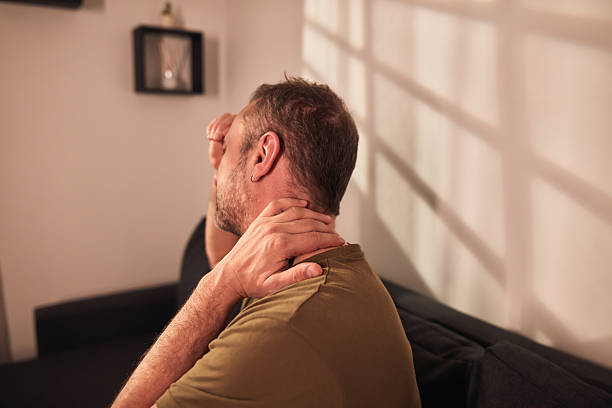 istock Man with neck, muscle, back and sciatica pain at home. 2252825877