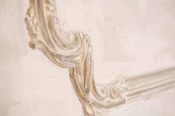 Beautiful plaster wall decor. Plaster decorations on the wall during renovation.