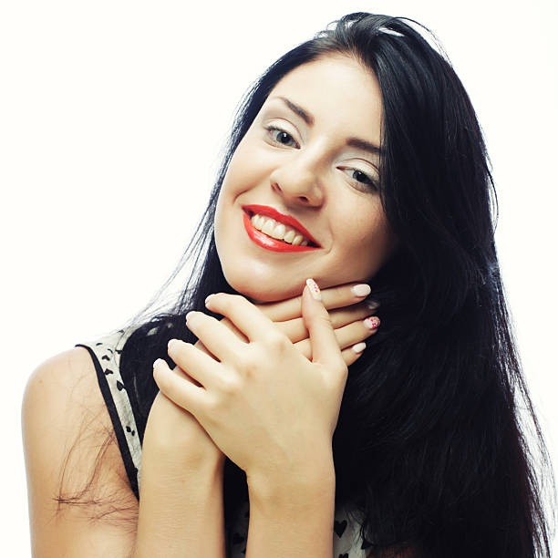 Close-up of beautiful face with flowers. On white background