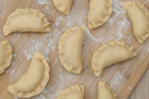 istock Homemade dumplings lie on the pastry board 2252831133
