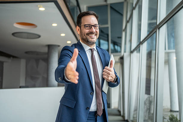 istock Businessman offering handshake for welcome and agreement 2252831911