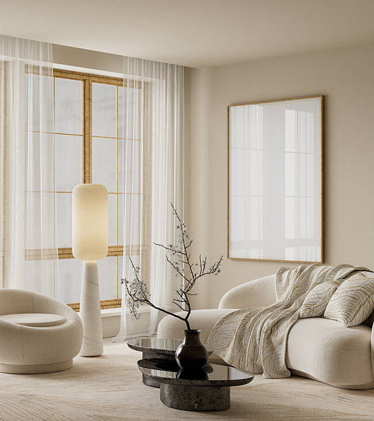 istock Minimalist Japandi mock-up poster frame scene with warm lighting, soft neutral seating and natural textures creating a calm, refined contemporary interior mood. 3D illustration. 2252835822