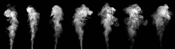 istock Realistic white smoke plumes rising on a black background, perfect for visual effects, product design, advertising, and creative projects that require natural vapor texture and atmospheric mood. 2252836514