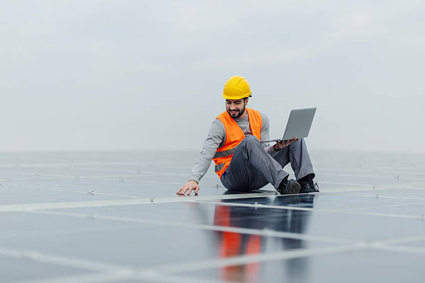 istock Engineer monitoring solar panel performance on modern power plant 2252837760