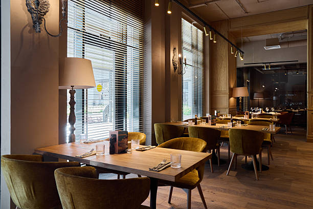 istock sunny cafe with comfortable seating, sundrenched cafe corner featuring inviting furniture and lively scene 2252839807
