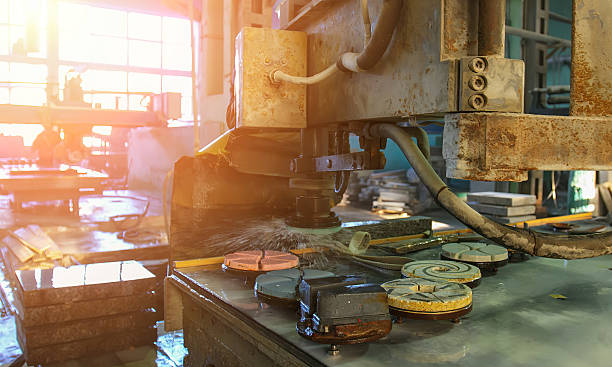 istock Precision cutting of materials in a workshop during golden hour light 2252847566
