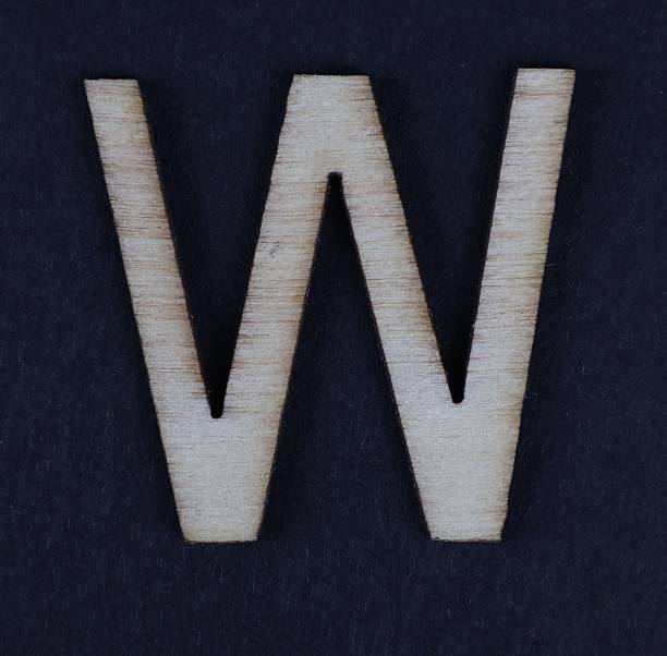 W uppercase letter in woodgrain style. Part of a series, black background.