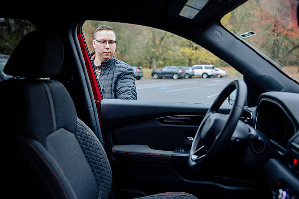 istock Man Opening Car Door 2252855291