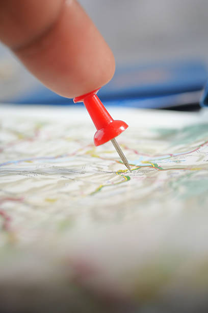 istock Marking a destination on a map with a red pin 2252859313