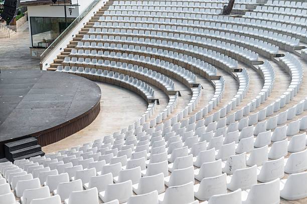 istock Empty seating in outdoor theater awaiting event during midday sunlight 2252859945
