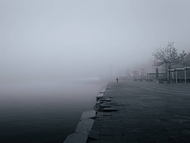 istock Minimalist Misty Waterfront Embankment 2252860500