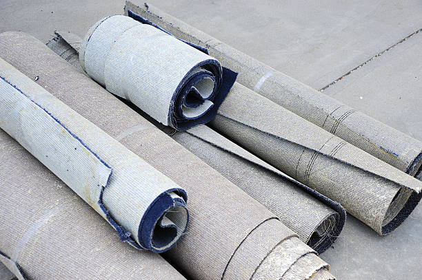 istock close up on old carpet roll during office renovation 2252860640