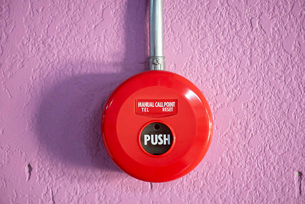 istock Red Manual Call Point on Pink Wall 2252864167