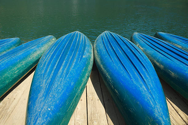 kayaks moored at the pier, water activities, outdoor recreation, lake