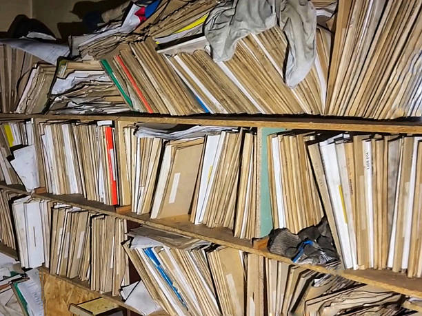 istock Abandoned Rural Library Shelves with Old Books and Magazines 2252871543