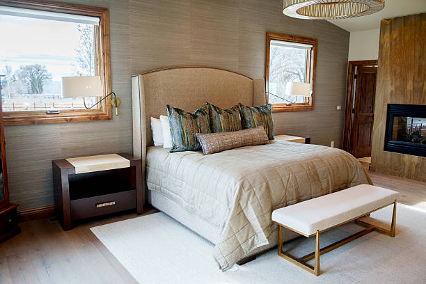istock Home Showcase Bedroom Interior With Upholstered Bed And Fireplace 2252874825