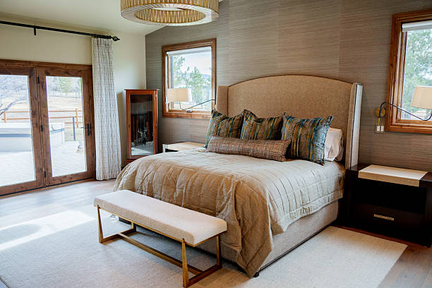 3d rendering of wooden bedroom with panoramic roof in a cabin house