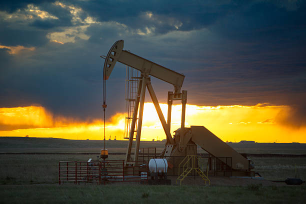 istock Permian Basin Pump Jack In Silhouette During Stormy Sunset 2252874892