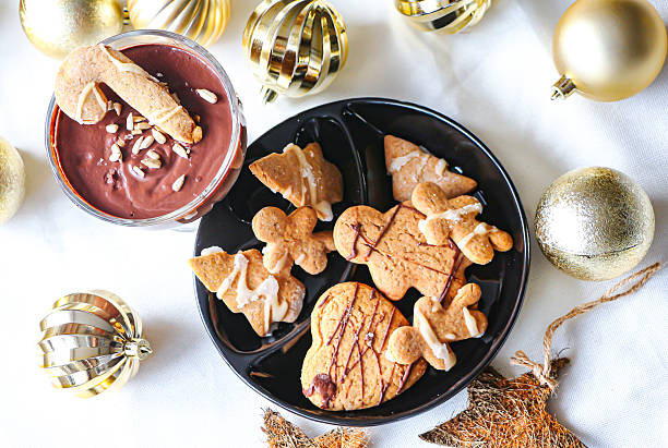 istock Festive Gingerbread Cookies and Chocolate Dessert Flat Lay 2252877163