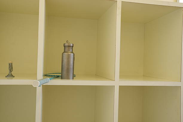 istock A metal water bottle sits on a shelf in a white box 2252884079