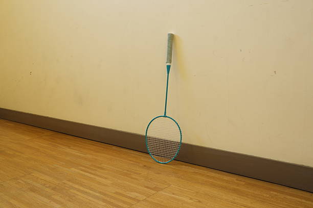 shuttlecock with racket frame isolated white background