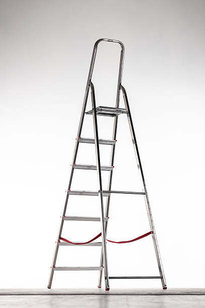 Metal ladder on white background. Studio shot