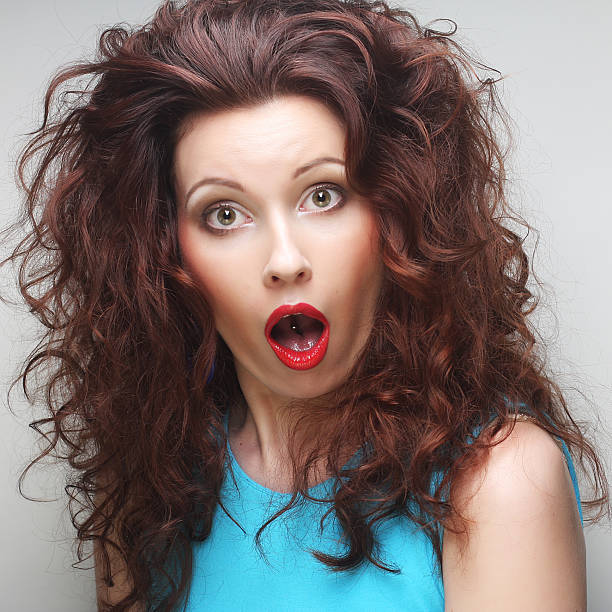 istock Beautiful young surprised woman. 2252897191