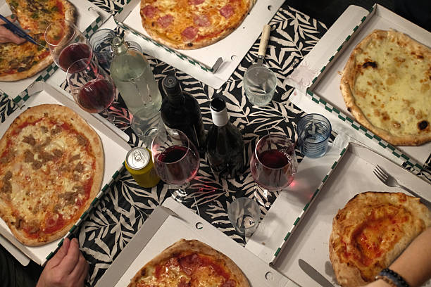 cheese and tomato pizzas as italian food ready to eat