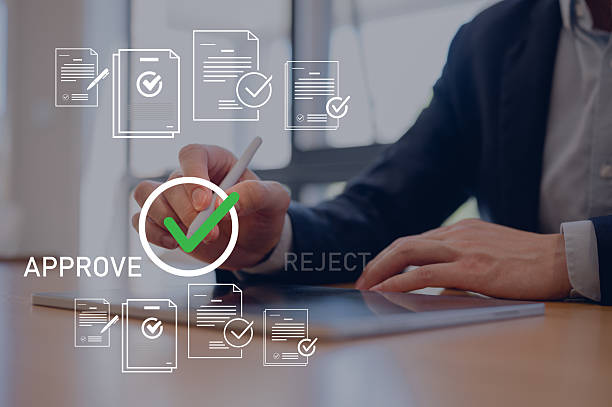 istock Businessman use pen digital tablet review electronic files, utilizing intelligent management system to validate records and streamline final approvals, Digital document workflow and quality assurance 2252898354