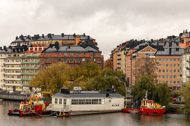 Stockholm, Sweden Oct 30, 2025 Liljeholmsbadet, a landmark bathhouse from 1930 in the Hornstull district and closed since 2016, is readied for towing to a shipyard for renovation.