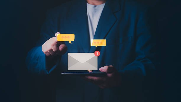 istock Communicating via email is essential in this age of fast-paced communication. The concept of business communication, email notifications, represents digital messaging modern workplace technology. 2252904236